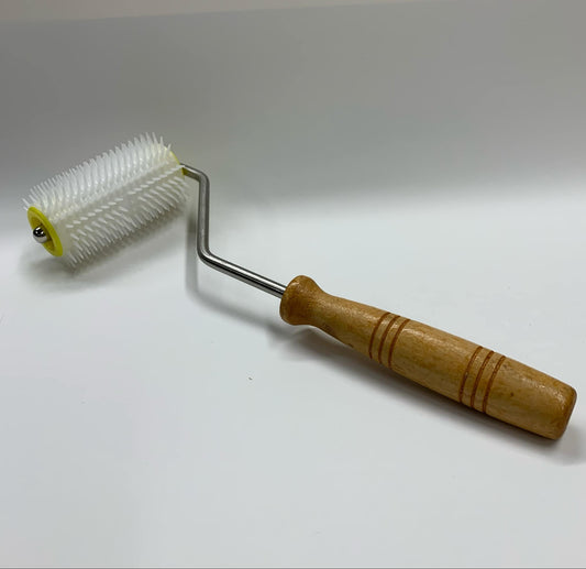 Uncapping Roller